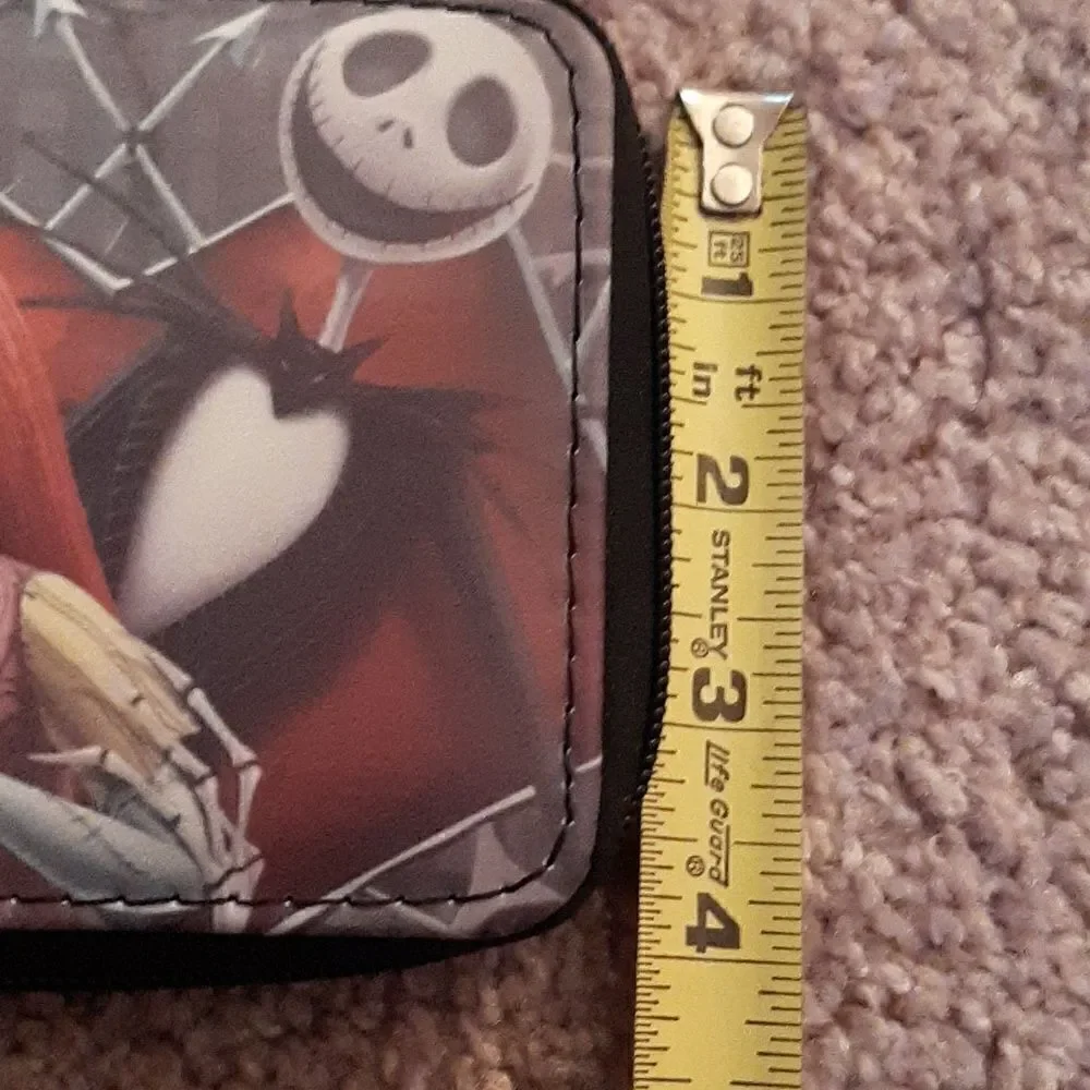 NWOT  Nightmare Before Christmas short wallet with zippered closure.
